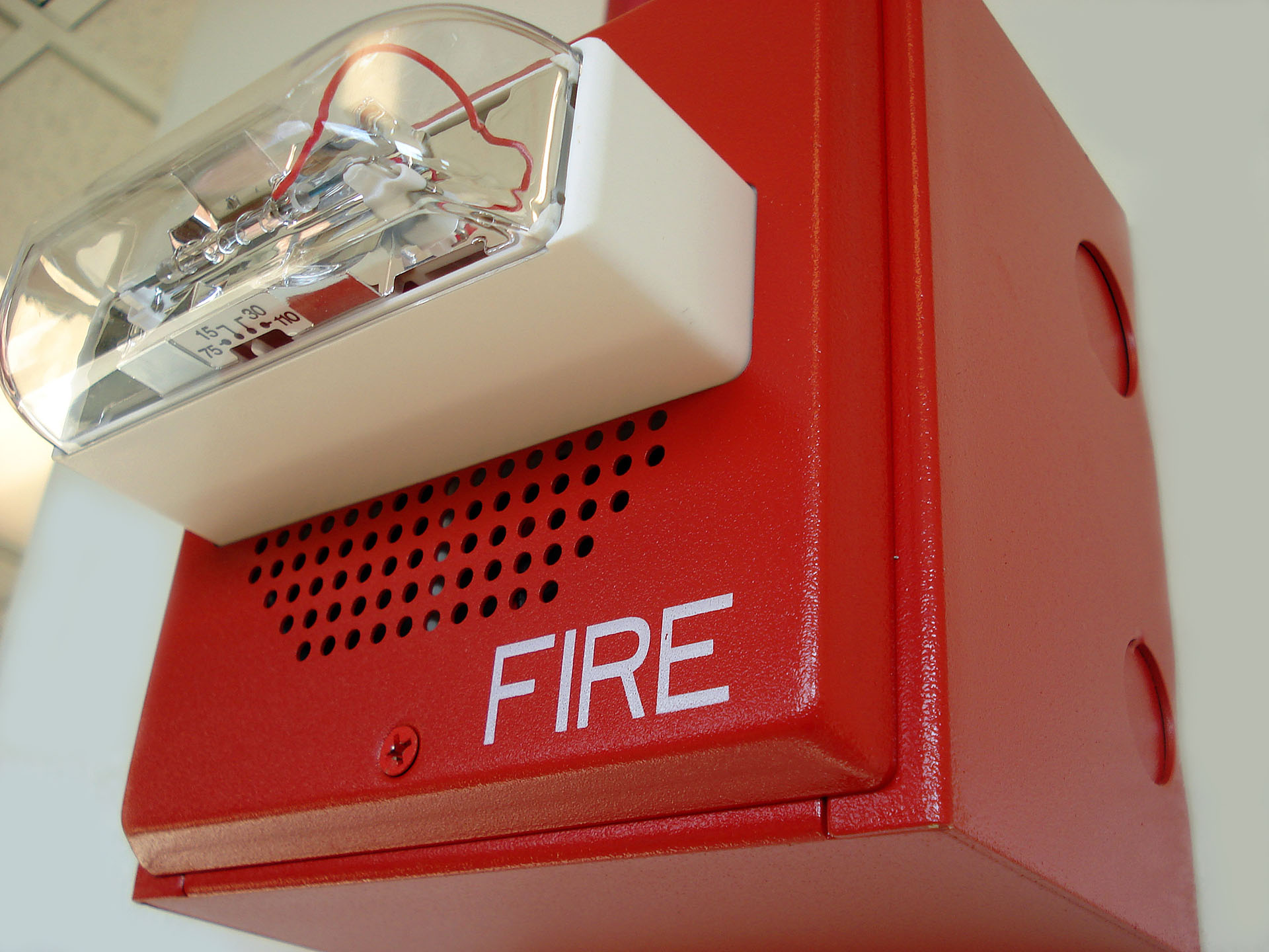 Fire alarm mounted on wall