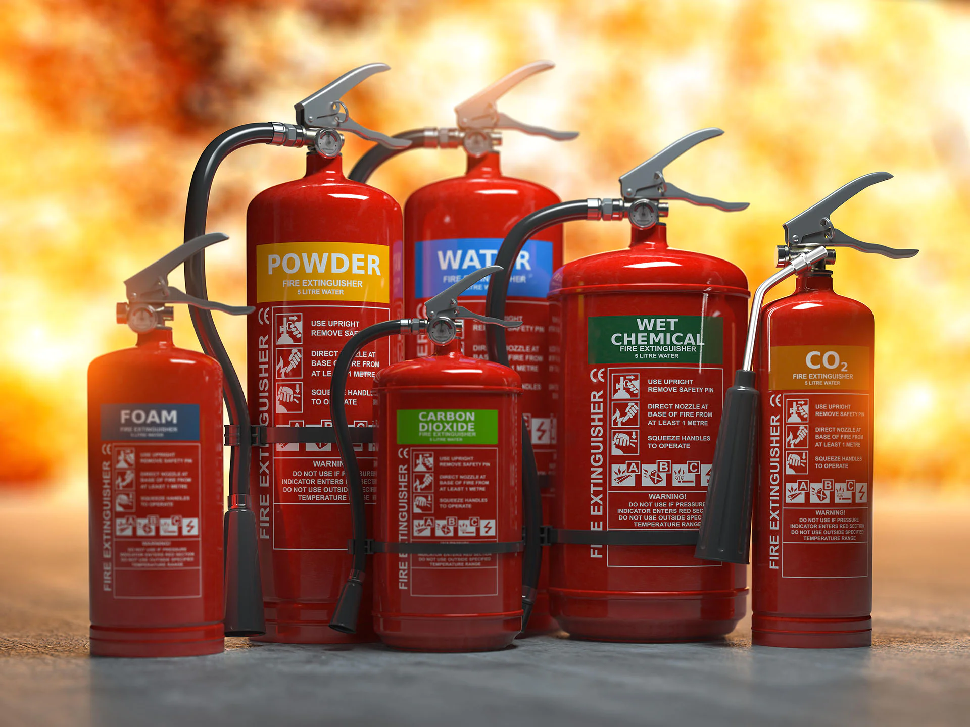 group of different types of fire extinguishers